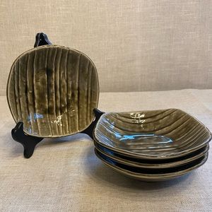 Set of four salad and/or dessert plates.